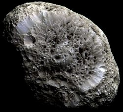 Saturn's Hyperion: A Moon
            with Odd Craters.